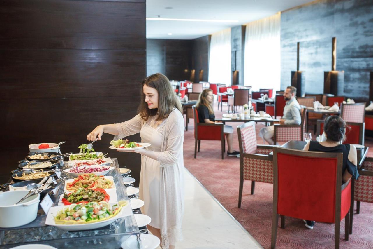 Royal M Hotel Fujairah By Gewan Exterior photo A buffet at a hotel